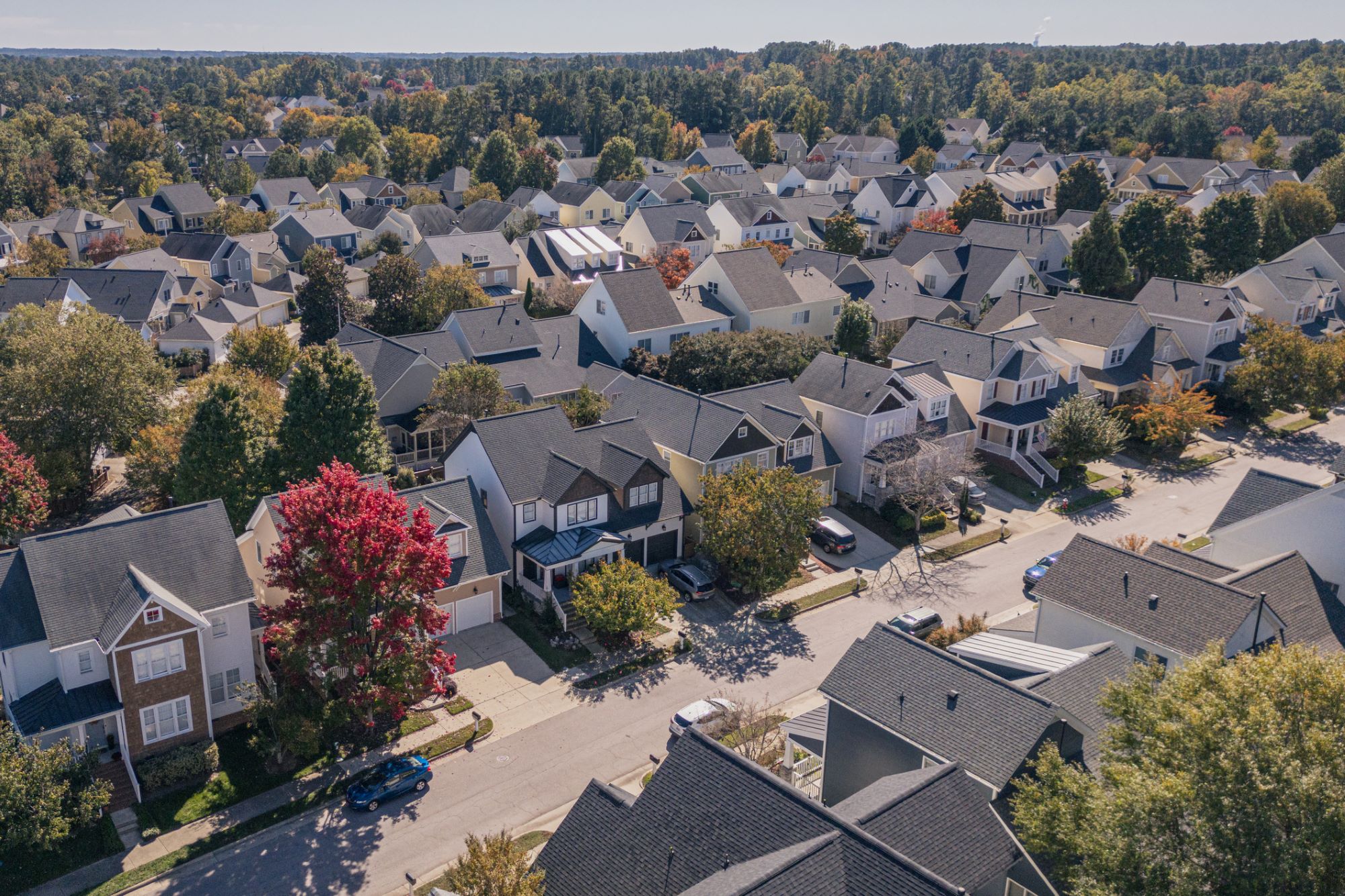 Drone view of suburban neighborhood.